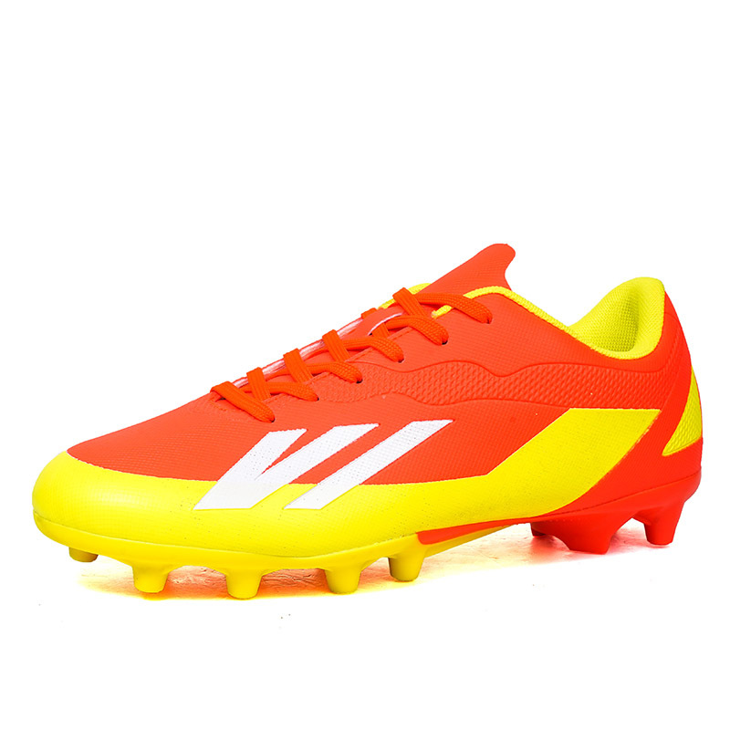 2025 zapatos de fútbol nuevo color juvenil anti-deslizante hombre y mujer AG clavos largos de césped estudiantes fabricantes transfronterizos