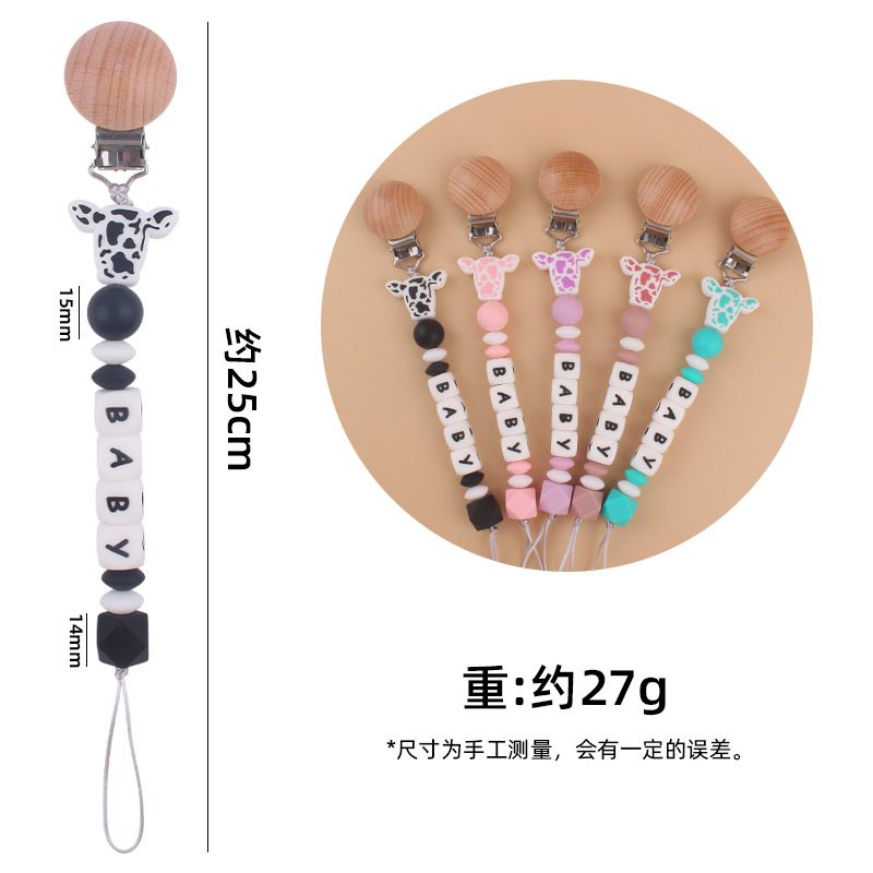 Nuevo bebé suministros de dibujos animados de silicona vaca cabeza mordedor creativo bebé DIY nombre mordedura pezón cadena anti-caída