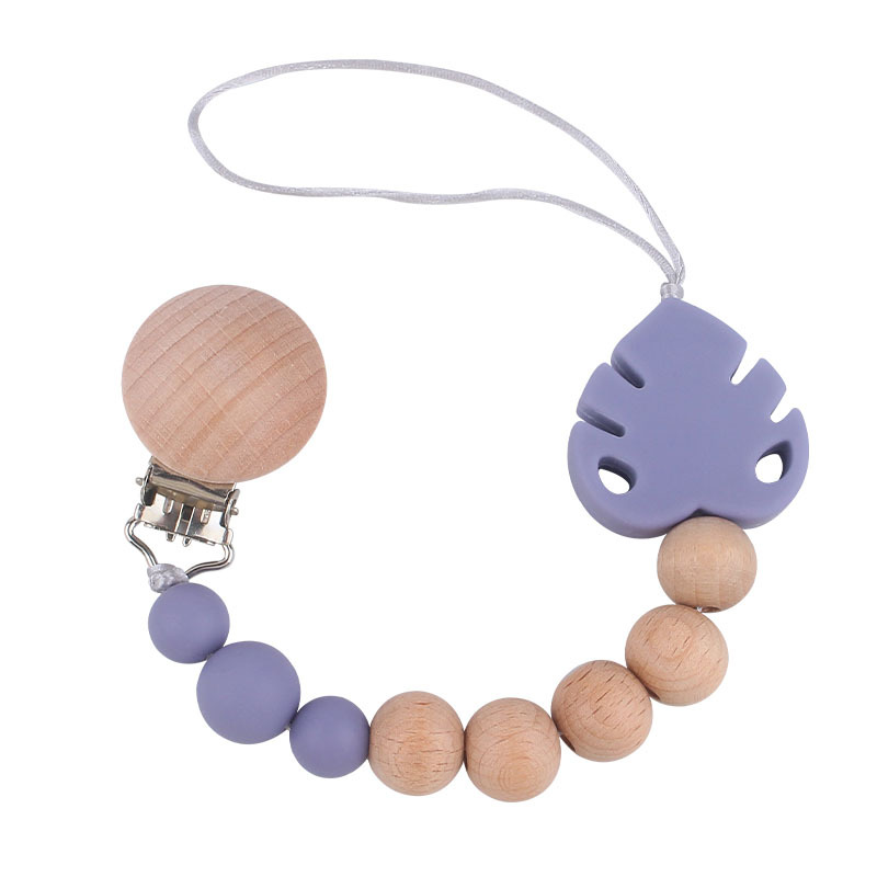 Suministros para bebés creativo haya chupete clip molar juguete mordedor bebé hoja de silicona chupete cadena anti-caída de la cadena
