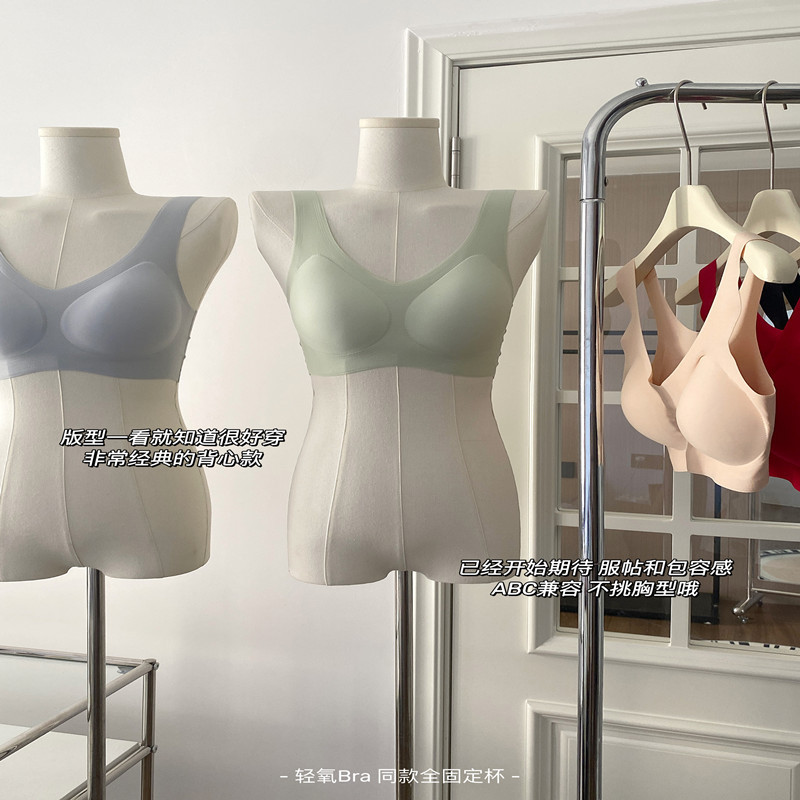 El procesamiento de la fábrica al por mayor pequeño pecho empuja hacia arriba la ropa interior sin costuras de las mujeres completo fijo Delgado inalámbrico deportes belleza espalda sujetador de las mujeres