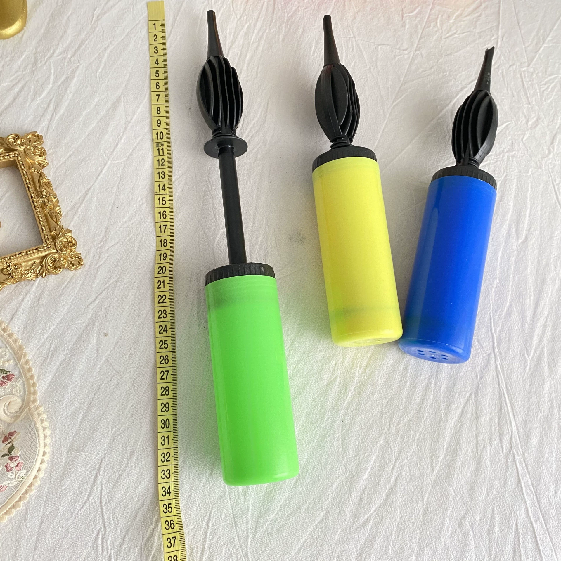 Handheld balloon, plastic air pump