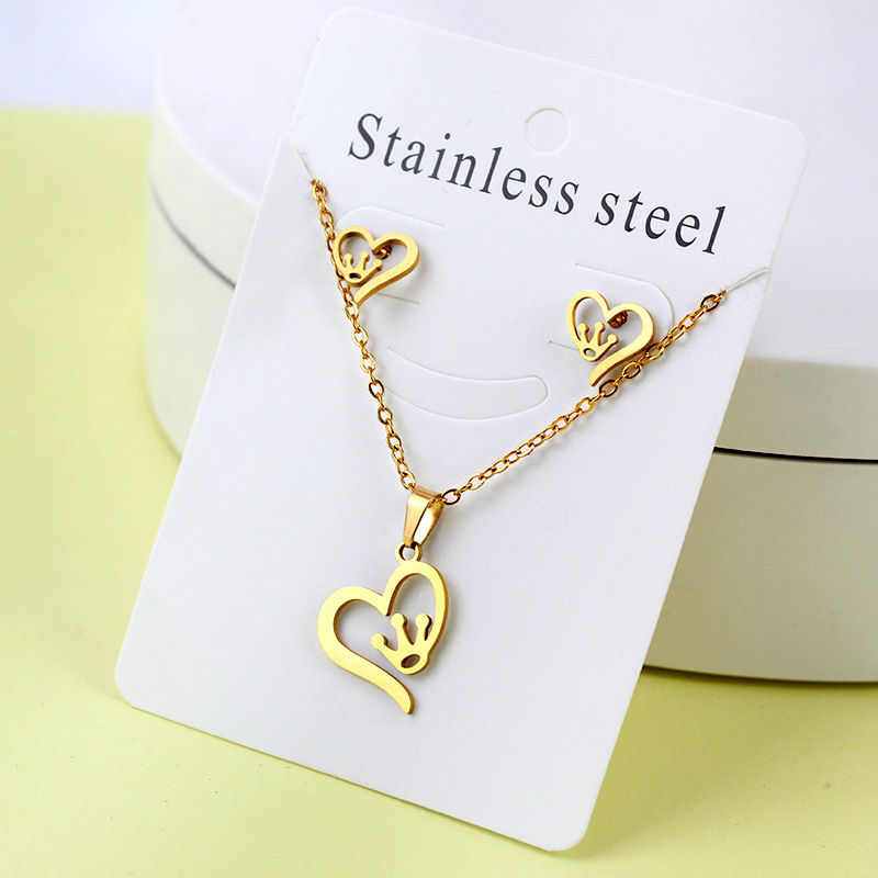 Conjunto de collar de pendientes de oro de acero inoxidable europeo y americano, collar de mariposa de amor de diamante, colgante, cadena de clavícula, fábrica al por mayor