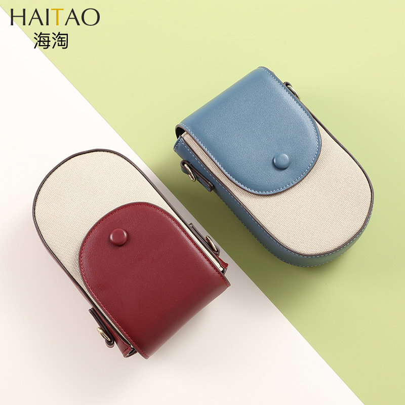 Bolso bandolera Mujer Versión coreana de la moda patrón de lona Versión vertical de la bolsa de teléfono móvil con múltiples tarjetas Versión coreana simple Bolso diagonal de un solo hombro al por mayor