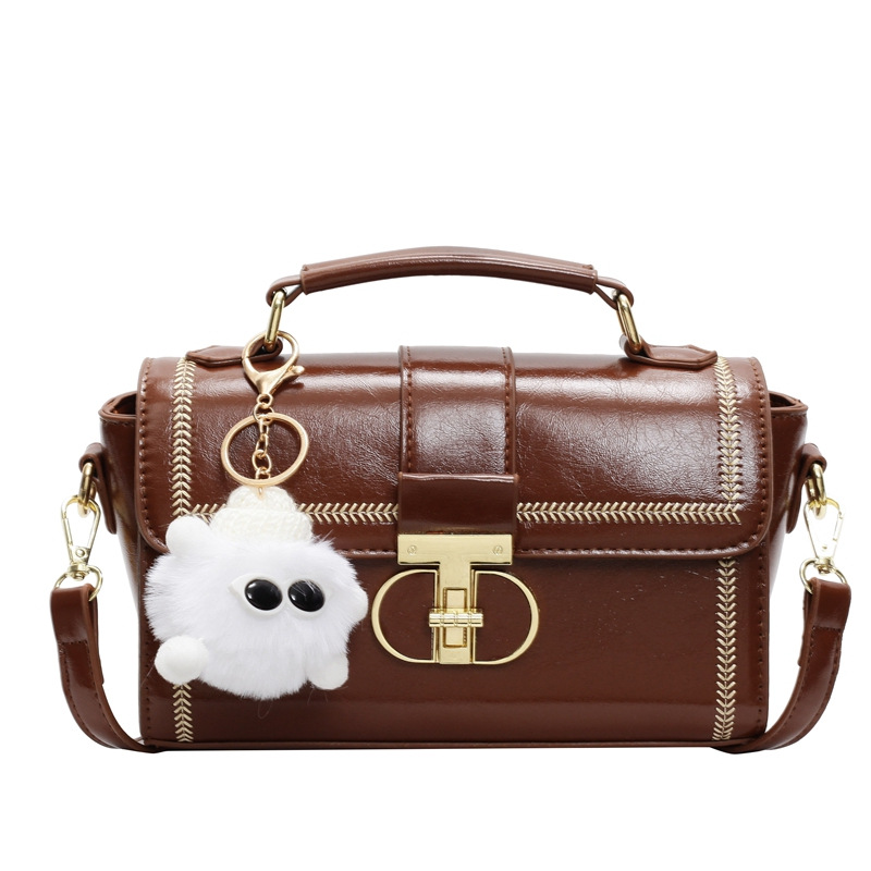 Bolsos de textura superior para mujeres 2025, nueva moda versátil bolso de mochila primavera y verano popular bolso de mano