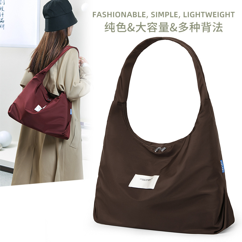 单肩斜挎包男女通用新款通勤托特包简约时尚大容量