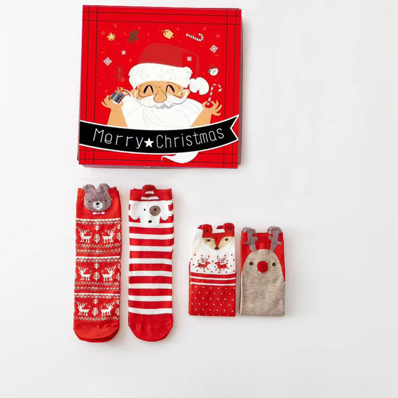 Medias de Navidad transfronterizas caja de regalo otoño y invierno nuevos productos de dibujos animados estereoscópicos lindos calcetines de mediana de mujer mediana medias rojas de Navidad al por mayor