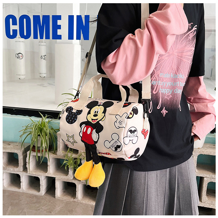 In 2024, the best-selling children's bags will feature cute Mickey Mouse-patterned bowling bags for girls, casual hand-held shoulder bags, and a unique style undefined