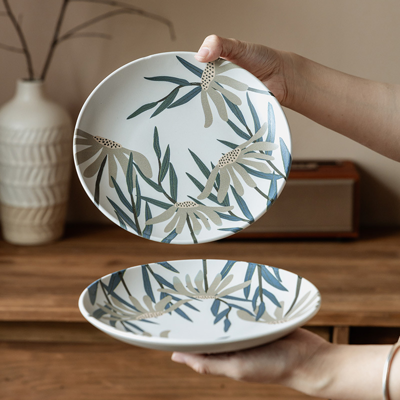 Plato de cerámica doméstica de hoja de bambú retro plato de platos redondos platos de platos creativos platos de platos de postre japonés al por mayor