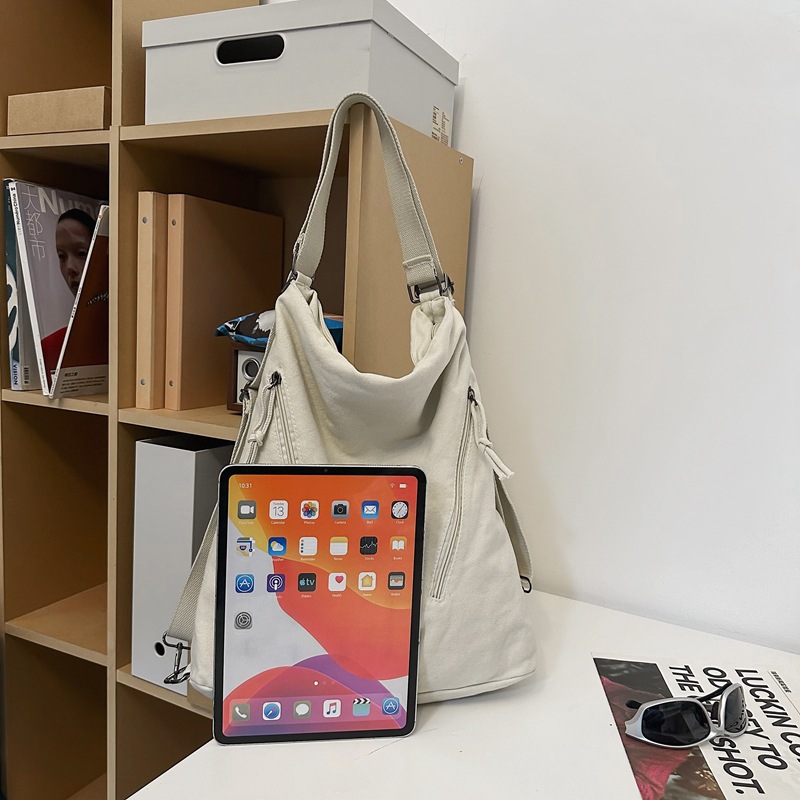 Bolso de lona para mujer 2024 nuevo bolso de mensajero de un solo hombro de gran capacidad mochila de viaje para estudiantes multifuncional al por mayor