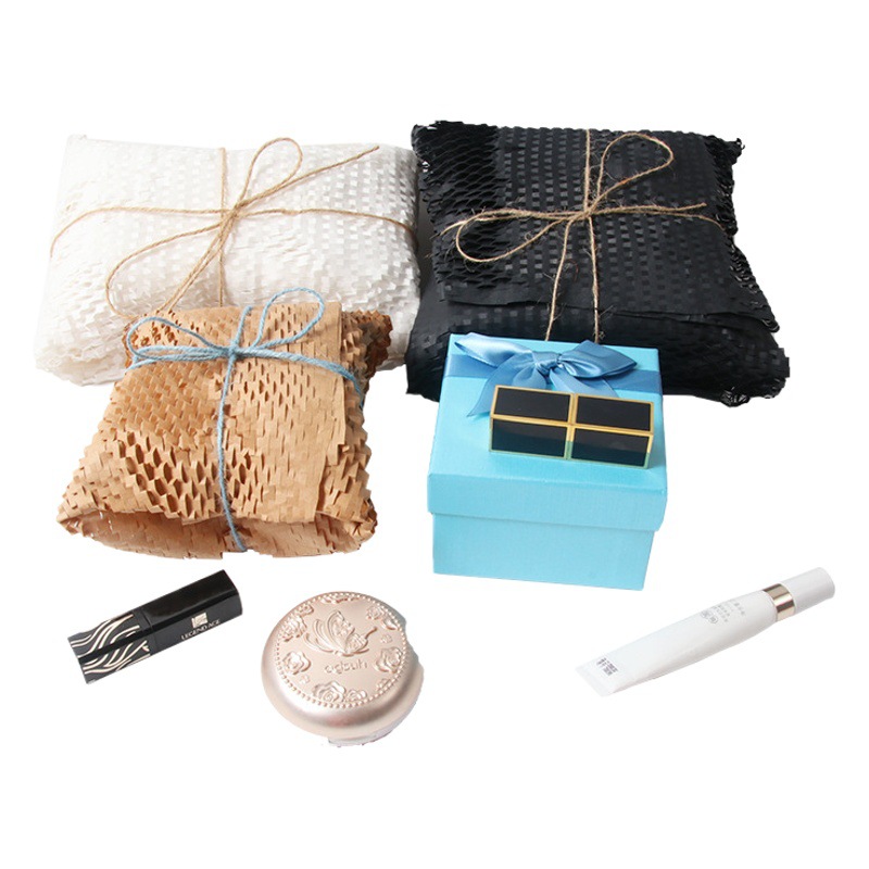 Papel de embalaje suministro directo de fábrica búfer degradable amortiguador de choque anti-colisión rollo de malla de papel Kraft 80g buffer papel de panal