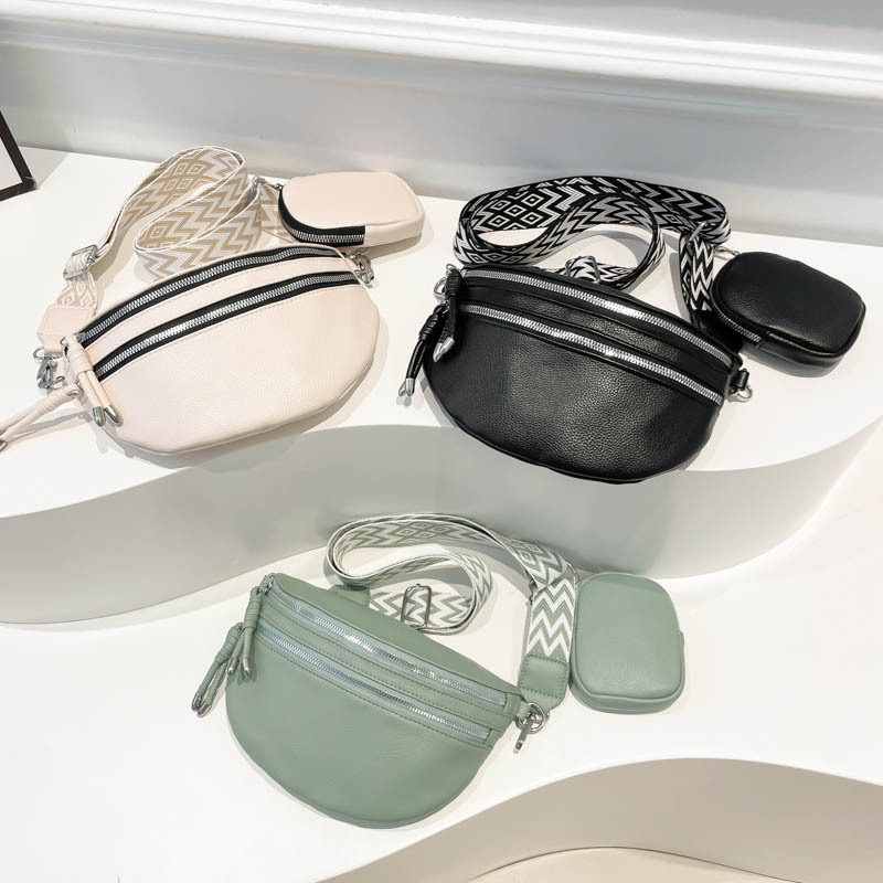 Moda 2024 invierno nuevo tipo de correa de hombro ancha estilo extranjero simple bolso de hombro casual de color sólido bolso de transporte ligero