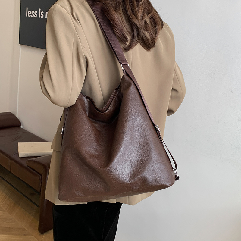 Retro gran capacidad versátil ins coreano de textura de viaje bolso de hombro para mujeres otoño y invierno 2024 nueva bolsa de mano