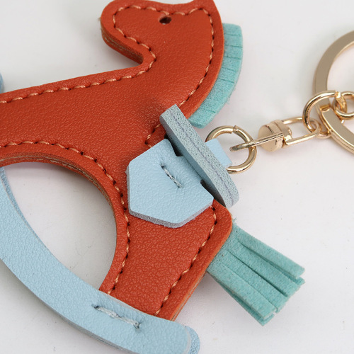 Best selling leather rocking horse key chain accessories pony pendant bag pendant cartoon small wooden horse key chain