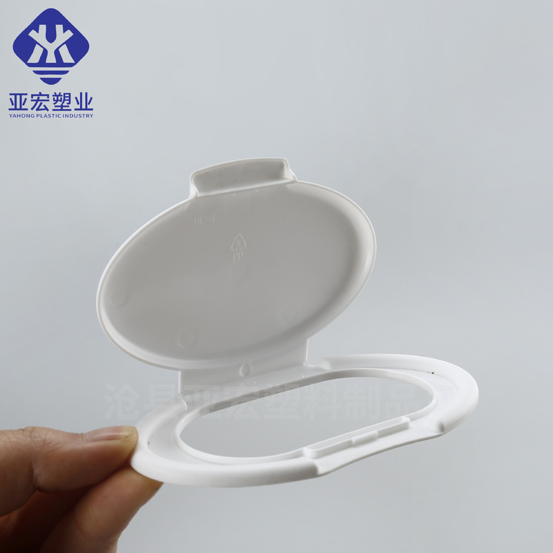 楕円形のウェットティッシュの蓋消毒ウェットティッシュのプラスチックの蓋はボタン式のウェットティッシュの蓋を押します。|undefined