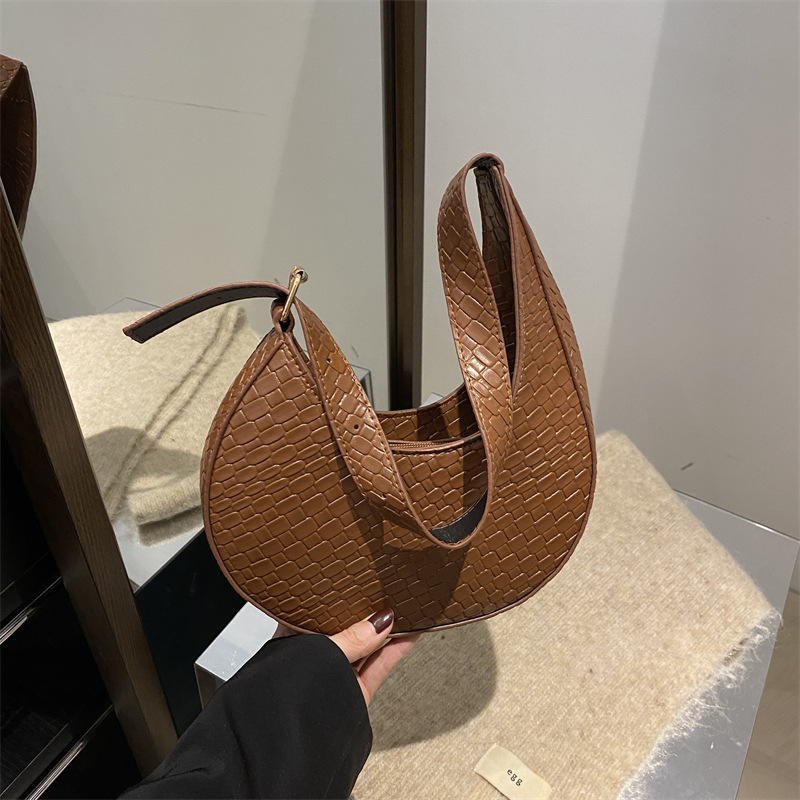 Bolsa de media luna francesa de tejido para mujeres 2025 nueva tendencia correa de hombro ancha textura de moda bolso de hombro bolso debajo de la axila