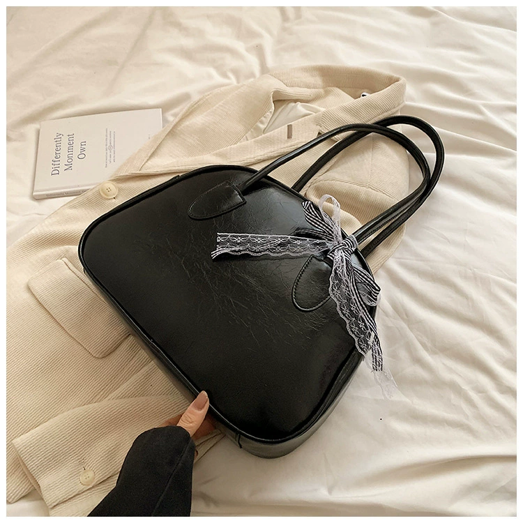 Small design handheld one-shoulder bag with bow, South Korea