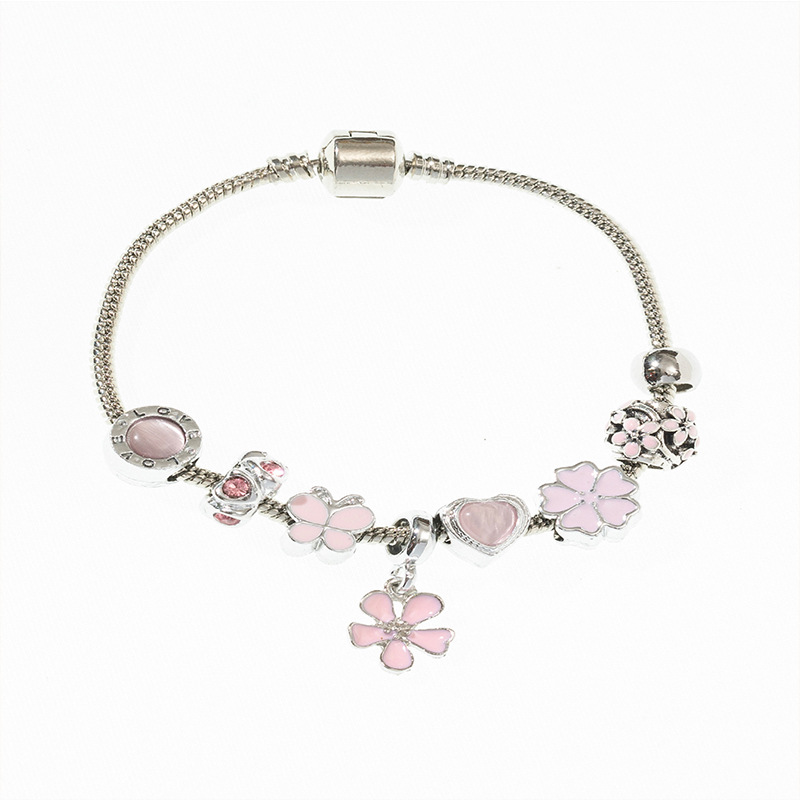 Panjia pulsera Dora DIY cuentas explosivas transfronterizas colgante pétalos de goteo de aceite ajustable flor amor pulsera de cobre
