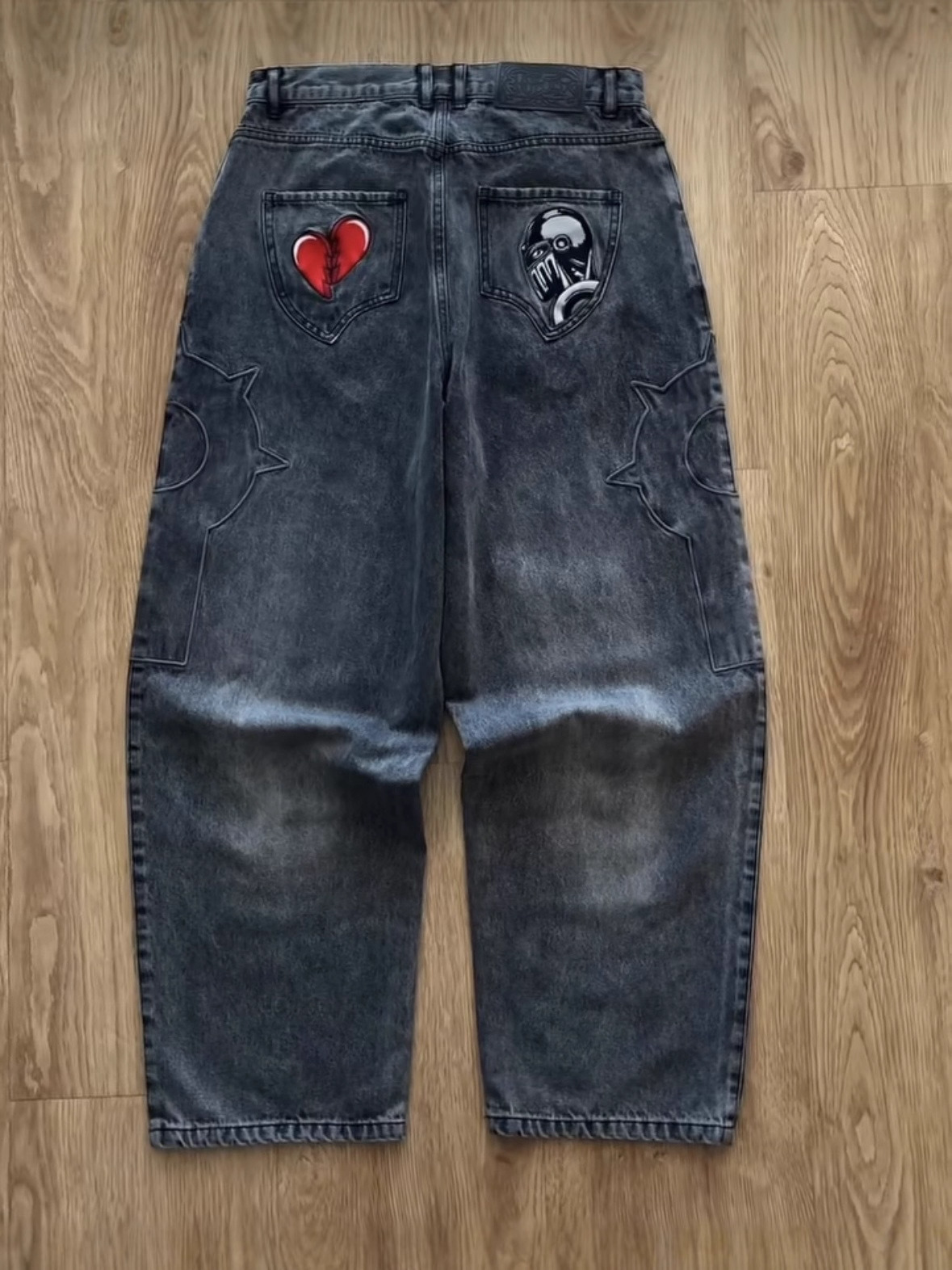 Europa y los Estados Unidos dibujos animados bordados transfronterizos jeans masculinos y femeninos Harajuku retro hacer viejos pantalones de tendencia universal