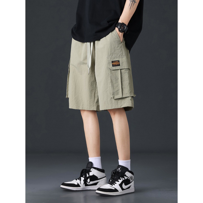 Pantalones cortos de trabajo de seda de hielo para hombres de verano delgados estilo de moda versátil vientos de puerto pantalones casuales deportivos sueltos