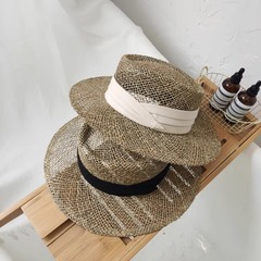 天然咸水草手編み海草麦わら帽子女性夏の透かし彫り通気日よけ帽子平頂礼帽日よけ