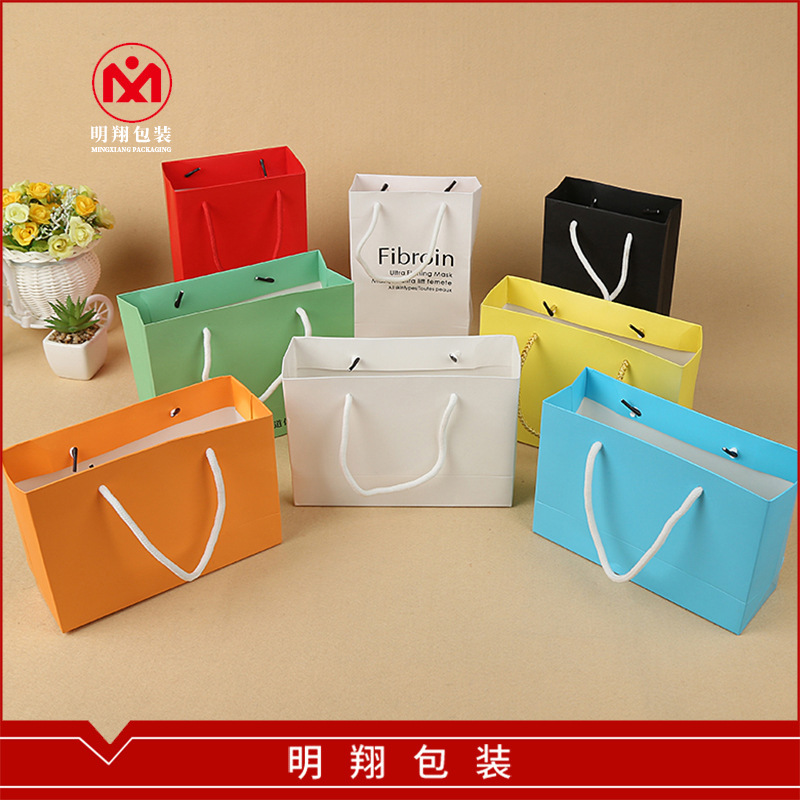 创意白卡纸袋高档礼品袋牛皮纸商场购物袋手提纸袋子logo