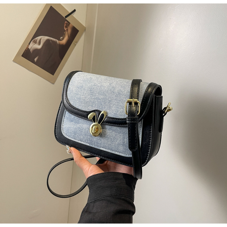 Texture denim saddle for women's 2024 summer new contrasting color lock buckle single shoulder bag, niche Western style_voghion.com