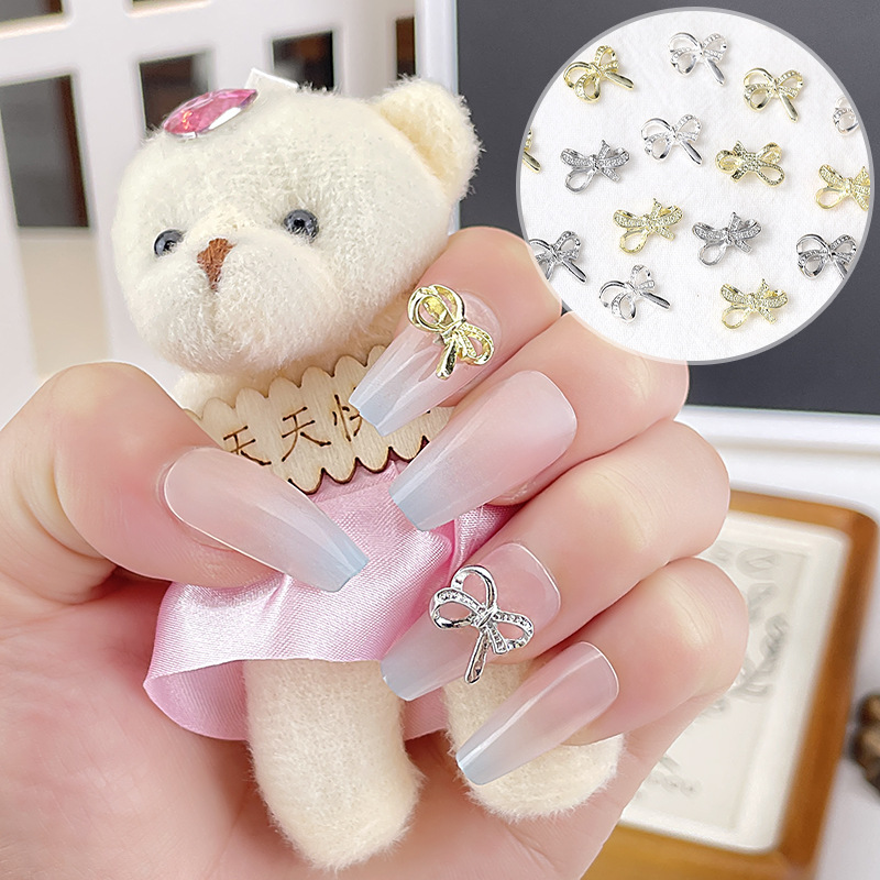 Nueva joyería de uñas, lazo, pajarita de lujo ligero, accesorios de uñas de aleación, accesorios de diamantes de uñas de celebridades de Internet tridimensionales, estilo caliente