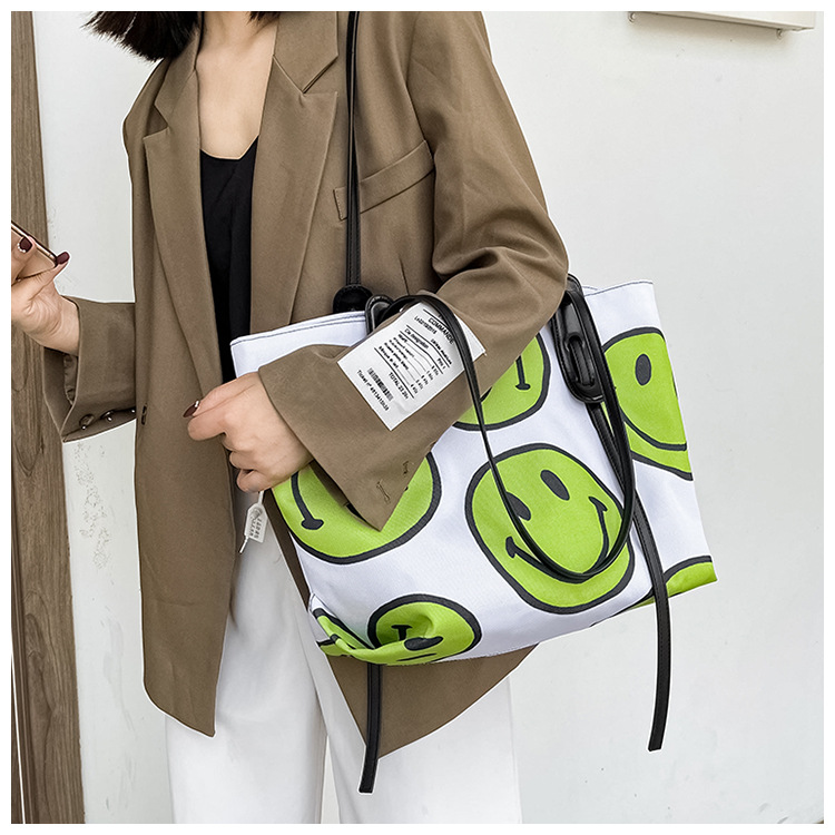 Korean Dongdaemun New Cute Fashion Smiley Canvas Women's Bag Printed Canvas Portable Shoulder Bag Large Tote Bag display picture 13