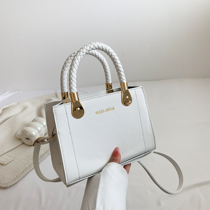 Bolso de mano de color sólido simple de estilo occidental para mujer bolso pequeño de cercanías 2023 bolso de mensajero de todo fósforo bolso de ocio marea