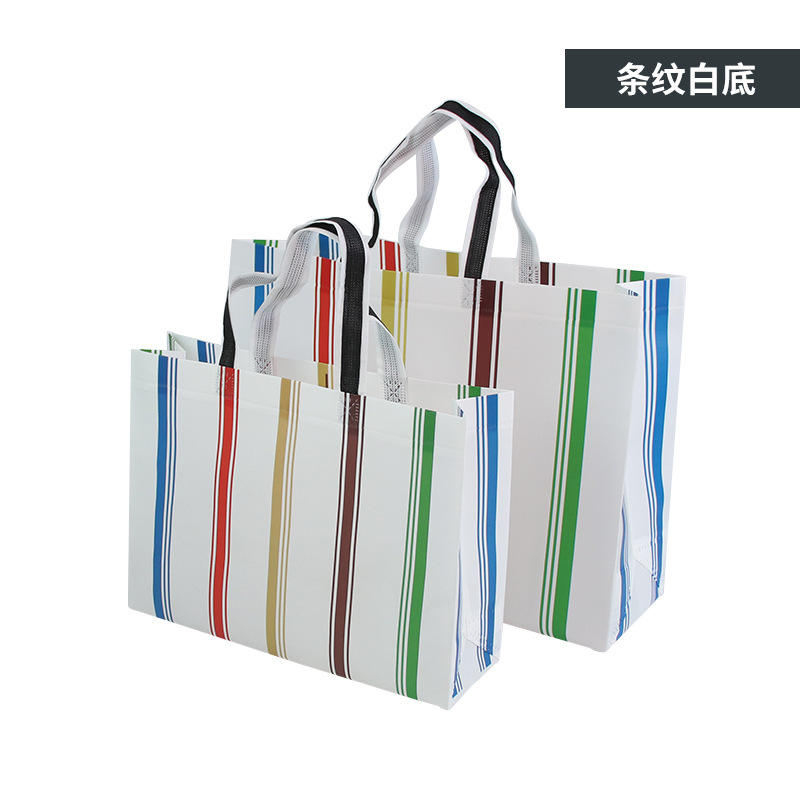 En stock bolsa de tienda de ropa logotipo personalizado bolsa de protección ambiental personalizada bolsa de embalaje de cuatro piezas bolso no tejido recubierto