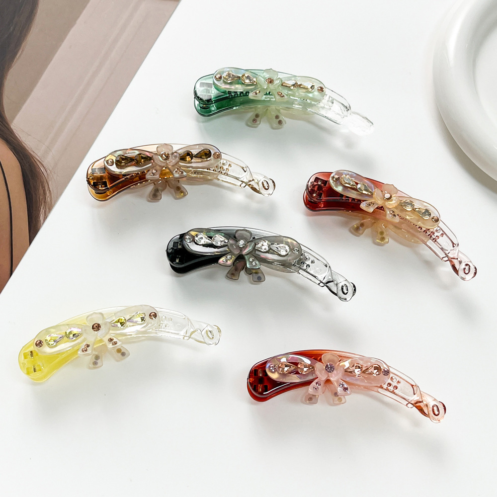 Pinza per capelli a banana con fiocco e strass elegante_voghion.com