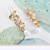 Cute earrings with tassels from pearl, flowered