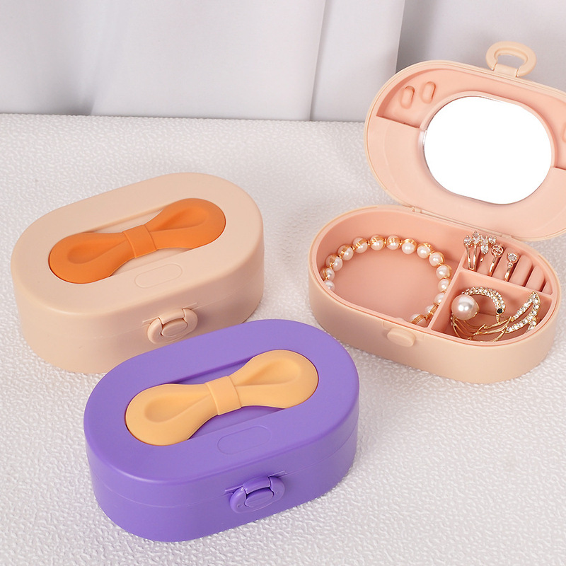 Exquisite and Compact Jewelry Box with Bow Handle for Rings, Bracelets, Necklaces, Earrings, Multifunctional High-End Jewelry Storage Box Exquisite and Compact Jewelry Box with Bow Handle for Rings, Bracelets, Necklaces, Earrings, Multifunctional High-End Jewelry Storage Box