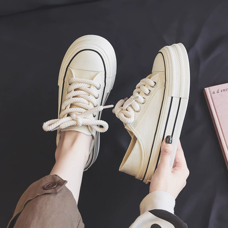 Пятно 2025 весна и лето новые студенты наполовину надевали два носить толстые подошвы, чтобы увеличить брезентовую обувь для женщин оптовая обувь для женщин