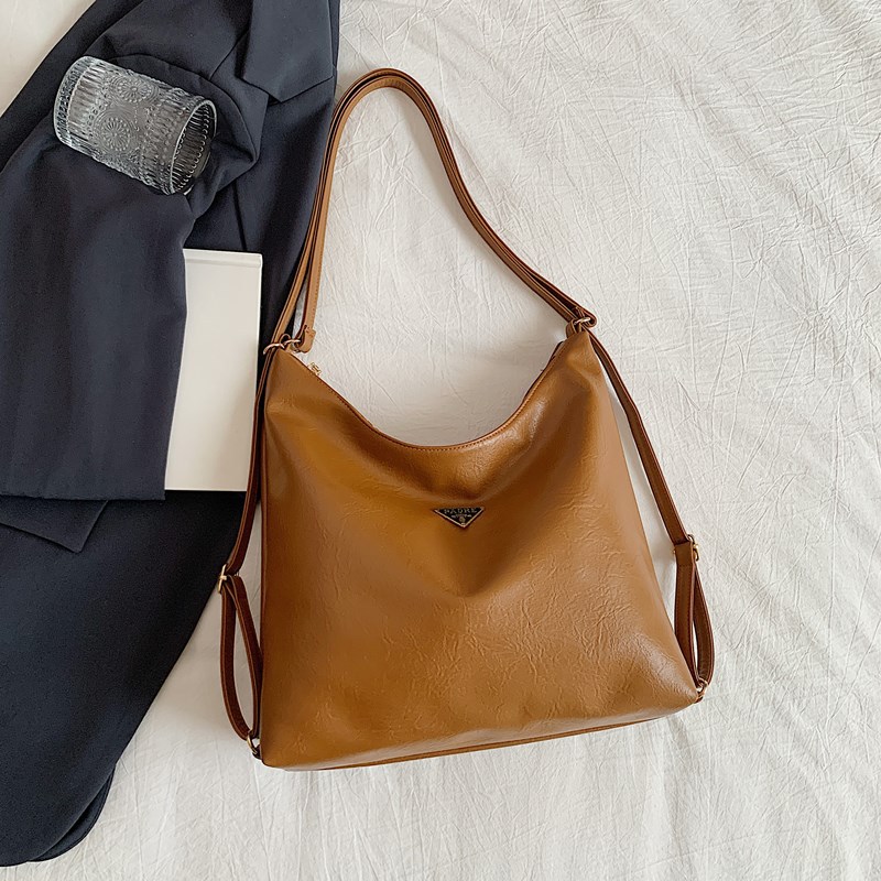 Bolso de mujer de gran capacidad primavera y verano 2025 nuevo tipo de mochila de cadena mochila de hombro de alta calidad sensación de viaje bolsa