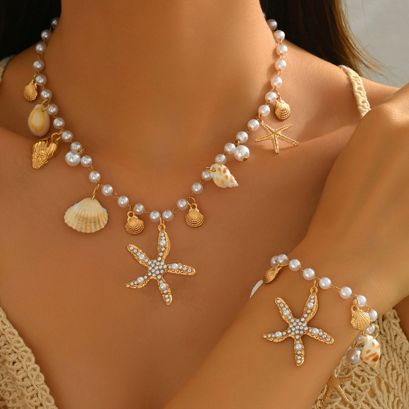European and American Accessible Luxury Ocean Style Pearl Jewelry Set Metal Style Pearl Conch Scallop Pendant Anklet Necklace Bracelet European and American Accessible Luxury Ocean Style Pearl Jewelry Set Metal Style Pearl Conch Scallop Pendant Anklet Necklace Bracelet
