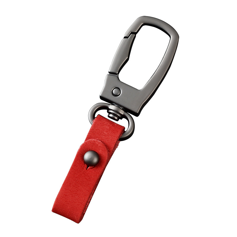 軽くて豪華な本革の自動車のキーホルダーの頭の層のつや消しの牛革の車のキーチェーンの個性のカップルの腰は掛けてペンダントをなくします。