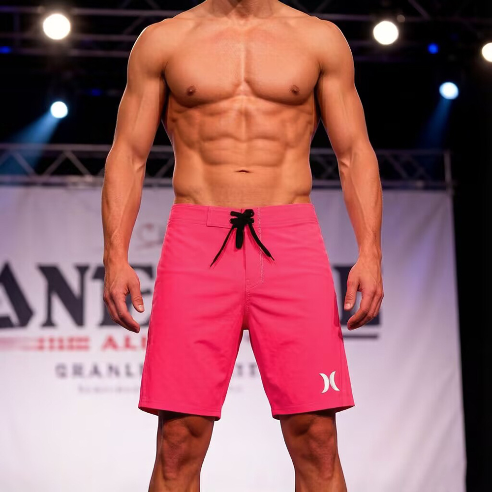 Pink solid color Hurley quick-drying surfing beach shorts for men competing in bodybuilding and physique competitions in Japan and South Korea.