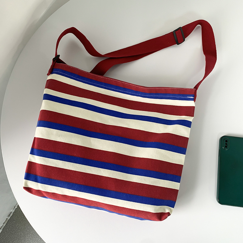 Nuevo Cruz-cuerpo bolsa de lona femenina de un solo hombro estudiante clase libro bolsa Bolsa de Comercio Exterior bolsa de la raya