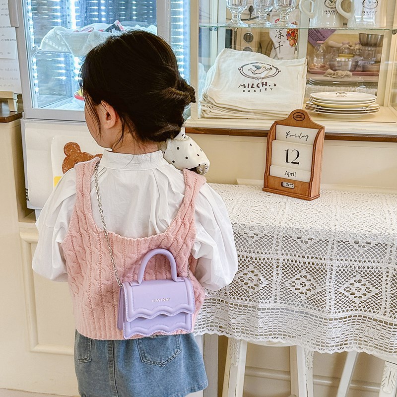 Bolso bandolera de niña coreana moda color sólido estilo occidental mini bandolera para niños verano nuevo alfabeto bolso para niños