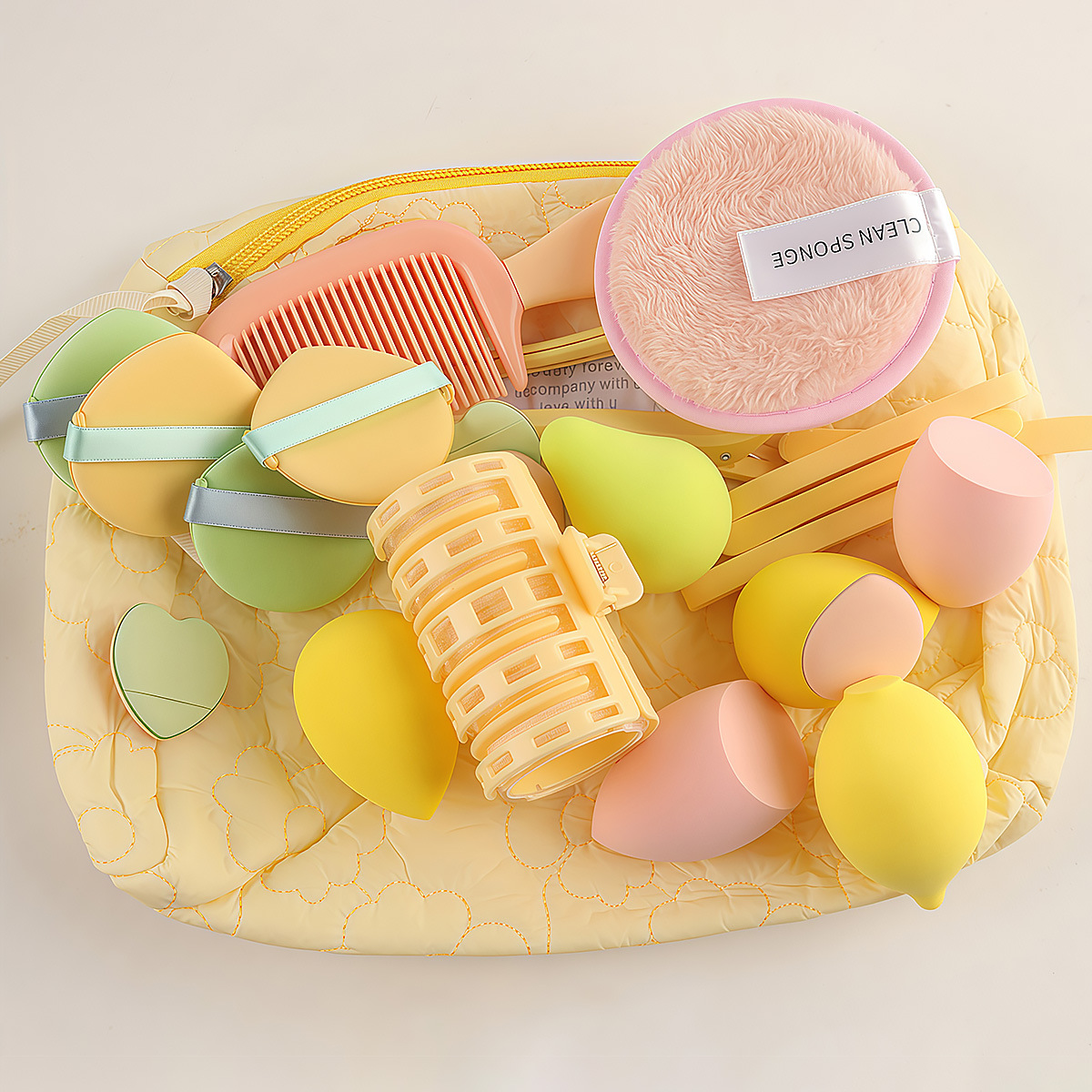 24 herramientas de belleza lindas amarillas con bolsas, rizos de hojaldre, maquillaje antes y después del maquillaje, combinación esencial para el cabello transfronterizo