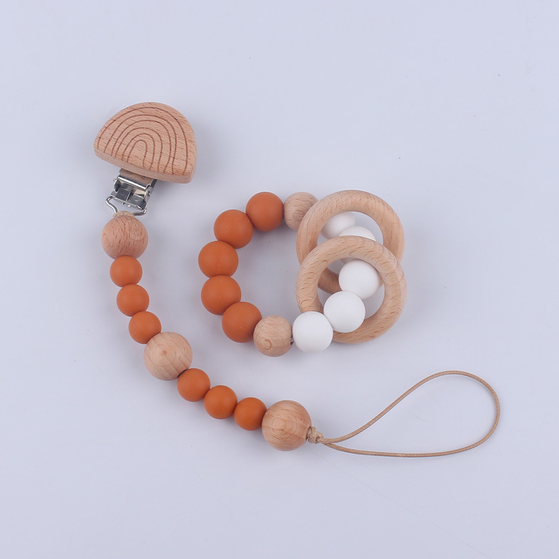 Nuevo Bebé y niño suministros de dibujos animados clip de haya calmante bebé chupete cadena mordedor pulsera de juguete conjunto de dos piezas