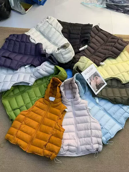 2026 Autumn/Winter New Women's Short Korean Style Versatile Hooded Ribbed Down Vest with 90% White Duck Down