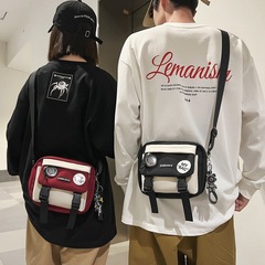 港風街頭運動單肩包男個性休閒小方包撞色百搭學生單肩包女斜挎包