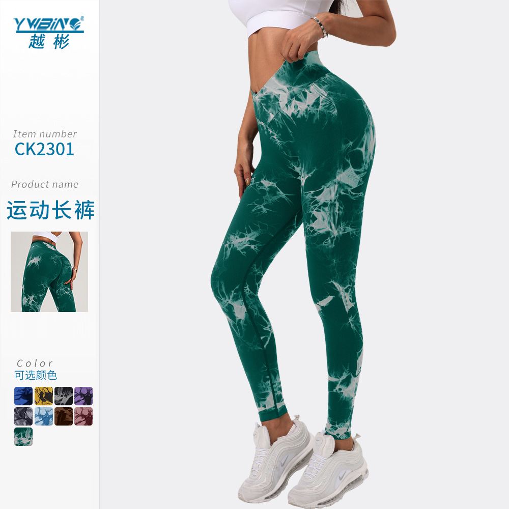 Nuevo europeo y americano sin costuras de cintura alta deportes Levantamiento de cadera de secado rápido pantalones de fitness apretados de las mujeres corriendo melocotón pantalones de yoga teñidos con lazo