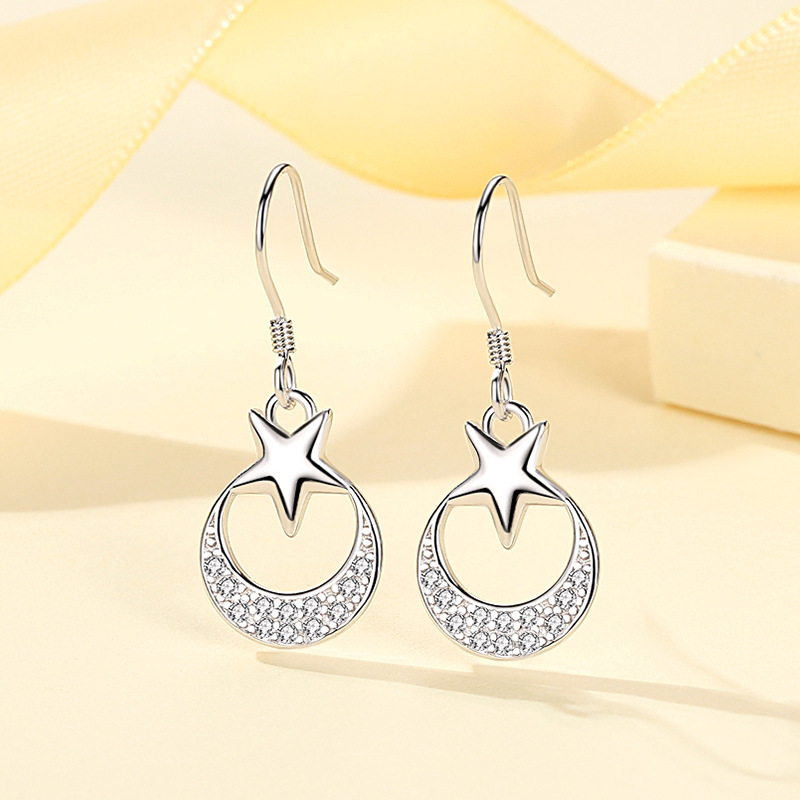 S925 nuevo estilo coreano pendientes de plata estrella Luna personalidad transfronteriza europea y americana pendientes de moda joyería al por mayor
