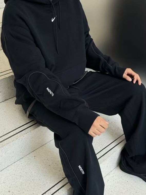 25 primavera y otoño explosión en el extranjero NK conjunta noc encapuchado conjunto de gancho impresión reflectante ropa deportiva casual pareja
