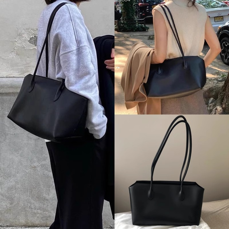 Le sac Row est fait de cuir véritable avec un design minimaliste et polyvalent. Il a une grande capacité d'épaule et un sac sous les bras,_voghion.com