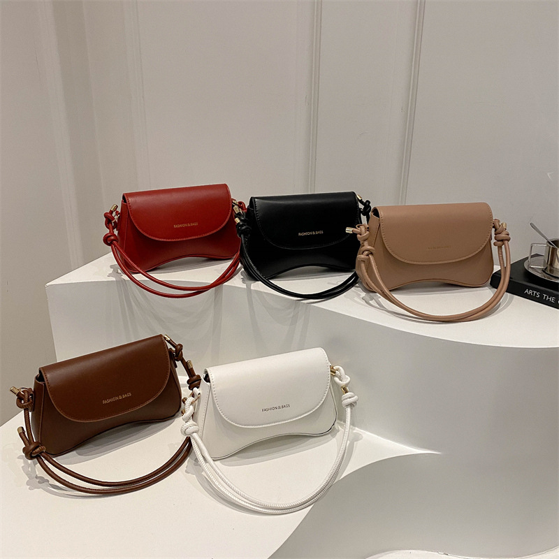Hong Kong retro color sólido bolso de mujer de estilo extranjero 2025, primavera coreana de textura bolso de hombro de moda bolso de moda