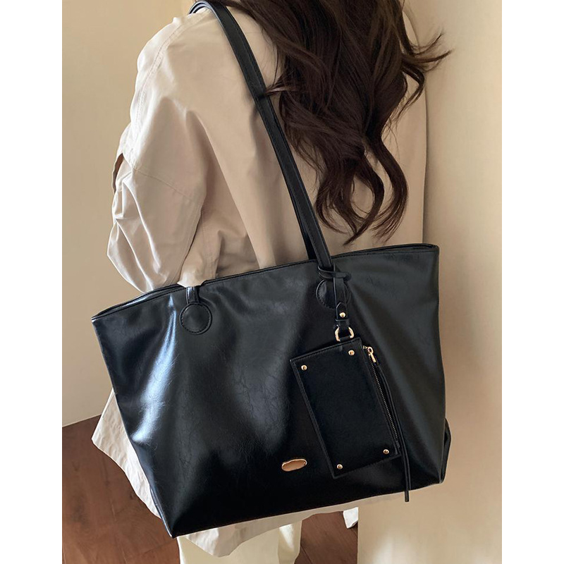 大容量手提包包女2025新款韩版简约单肩包腋下包休闲通勤包托特包